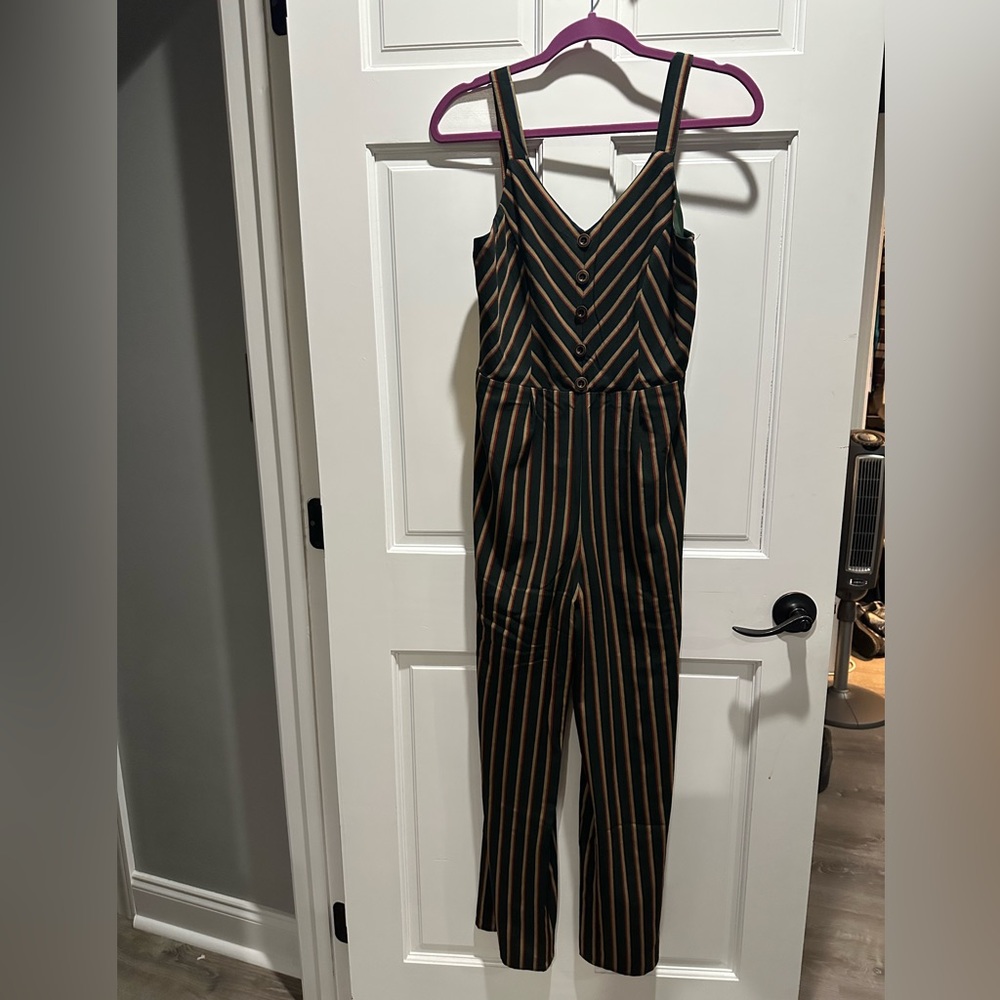 Jumpsuit. Fits like a small